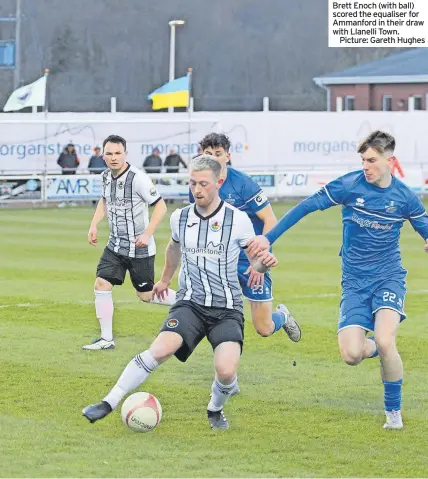  ?? Picture: Gareth Hughes ?? Brett Enoch (with ball) scored the equaliser for Ammanford in their draw with Llanelli Town.