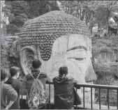  ??  ?? From left: The Giant Buddha in Leshan, Sichuan province, reopens on March 23. ZHANG CHAOQUN / XINHUA A rose garden attracts visitors to Jiujiang, Jiangxi province, on Sunday. WEI DONGSHENG / FOR CHINA DAILY Beijing WTown, a tourist attraction modeled on a water town, is back in business. Wuzhen, a water town in Zhejiang province, reopens on April 15. PROVIDED TO CHINA DAILY PROVIDED TO CHINA DAILY