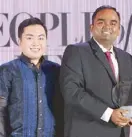  ??  ?? Singapore Airlines GM Balagopal Kunduvara receives the Airline of the Year award from PeopleAsia’s Jose Paolo dela Cruz.