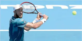  ?? PHIL WALTER/GETTY IMAGES ?? Steve Johnson plays a backhand during his first round match against Liam Caruana.