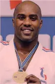  ??  ?? Il judoca Teddy Riner, 29 anni, due ori e un bronzo olimpico AFP