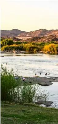  ??  ?? RIGHT From the campsite it’s a short swim to the middle of the river, where technicall­y you’ll be in Namibian waters.