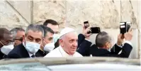  ?? The Associated Press ?? Pope Francis leaves the Sayidat al-Nejat (Our Lady of Salvation) Cathedral in Baghdad on Friday. Pope Francis honored victims of one of Iraq’s most brutal massacres of Christians by Islamic militants. In 2010, al-Qaida-linked militants gunned down worshipper­s at the church in an attack that left 58 people dead.