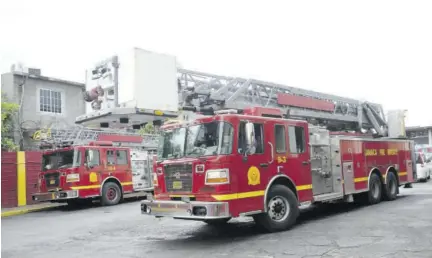  ??  ?? Two of three hydraulic platform fire engines assigned to the Kingston and St Andrew division.