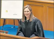  ?? DAME VIA USA TODAY] ?? Amy Coney Barrett speaks at her investitur­e as a judge for the U.S. Court of Appeals for the Seventh Circuit at the University of Notre Dame Law School on Feb. 23, 2018, in Notre Dame, Indiana. [JULIAN VELASCO/UNIVERSITY OF NOTRE