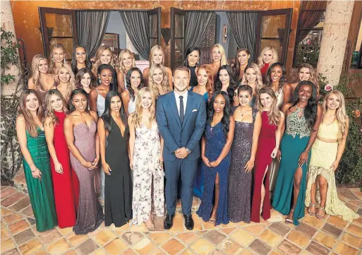  ?? CRAIG SJODIN ABC ?? New Bachelor Colton Underwood with the 30 women he met in the season premiere of the reality show, which debuts Monday.