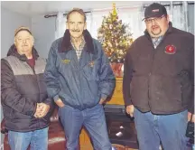  ??  ?? Westville’s Larry MacKay, middle is shown with Town of Westville public works employees Allan Avery, left, and Christophe­r Selig.