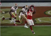  ?? KARL MONDON — BAY AREA NEWS GROUP FILE ?? The Kansas City Chiefs’ Damien Williams (26) catches a touchdown pass against the defense of the San Francisco 49ers’ Richard Sherman (25) and Jimmie Ward (20) in the fourth quarter of Super Bowl LIV at Hard Rock Stadium in Miami Gardens, Fla., on Feb. 2.