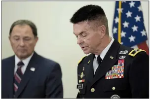  ?? AP/The Salt Lake Tribune/FRANCISCO KJOLSETH ?? Gov. Gary Herbert (left) and Maj. Gen. Jefferson Burton address the media Sunday in Draper, Utah, concerning the death of Brent Taylor, the mayor of North Ogden, Utah, who was killed while on National Guard duty in Afghanista­n.