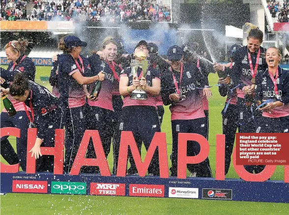  ?? PICTURE: Getty Images ?? Mind the pay gap: England celebrate their World Cup win but other countries’ players are not so well paid