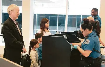  ?? James Nielsen / Houston Chronicle file ?? Passengers are screened by Transporta­tion Security Administra­tion officers at Bush Interconti­nental Airport. A security consultant says a combinatio­n of efforts has made airports more secure. “When you put all those layers of security together, you’ve...