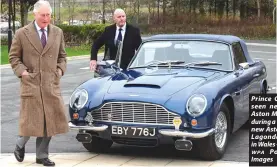  ?? WPA ?? “I must be an old Aston Martin, as I run on exactly the same,” wrote one Twitter user. — The Washington Post.
Prince Charles is seen next to his Aston Martin DB6 during a visit to the new Aston Martin Lagonda factory in Wales — Picture:
Pool/ Getty Images