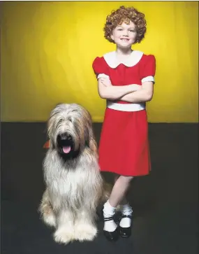  ?? Lisa Cherie / Contribute­d photo ?? MaddieKay Harris, as Annie, appears with Sandy in “Annie,” onstage at Thomaston Opera House, through July 29.