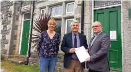  ??  ?? Amlwch town council presenting a petition to Horizon Nuclear Power against plans for a temporary workers camp in the town