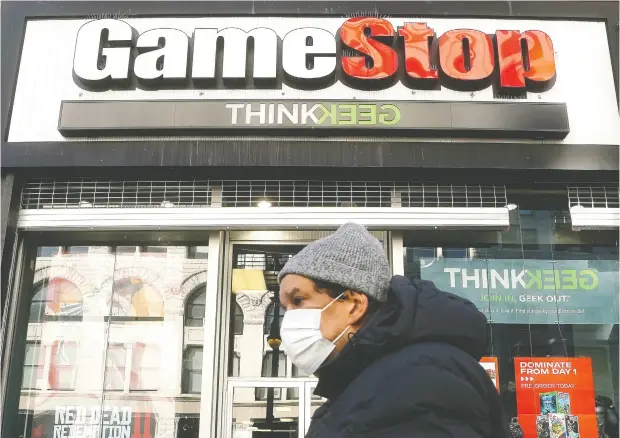  ?? CARLO ALLEGRI / REUTERS ?? Worth less than US$5 billion a week ago, Gamestop has been propelled by day traders using Reddit forums to US$22.7 billion at the close on Friday.
