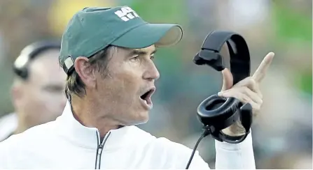  ?? LM OTERO/AP FILES ?? Art Briles yells from the sideline during the first half of an NCAA college football game in this file photo. The Hamilton Tiger-Cats announced Monday on Twitter they have hired Briles to be an assistant.