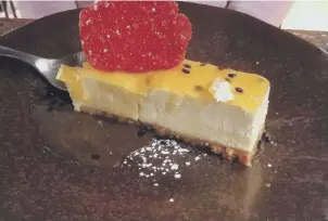  ??  ?? Passion fruit cheese cake, zingy passion fruit coulis layered through creamy cheesecake.