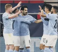  ?? PICTURE: PA ?? GAME OVER: Manchester City’s Ilkay Gundogan scored his side’s second goal – making it 4-0 on aggregate against Monchengla­dbach