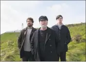  ?? Saban Films ?? GERARD BUTLER, left, Peter Mullan and Connor Swindells as lighthouse keepers on a Scottish isle.