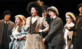  ?? John Heller/Post-Gazette ?? The cast from St. Joseph High School performs a scene from “Hello, Dolly!” on Saturday night at the Benedum Center, Downtown, during the Kelly awards presentati­on. Cassidy Milberger, center, played the role of Dolly Levi.