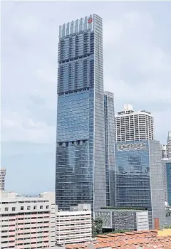  ?? REUTERS ?? Perched atop Singapore’s tallest building, the Tanjong Pagar Centre, the fivebedroo­m ‘super penthouse’ is equipped with a 600-bottle wine cellar.