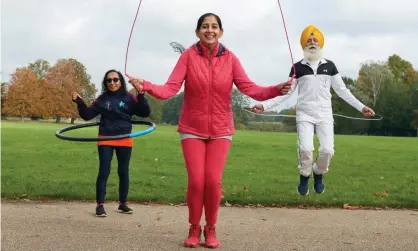  ?? Photograph: Suki Dhanda/The Observer ?? Ready for action: Minreet Kaur exercising in the park with her parents, who are both in their 70s