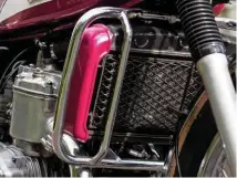  ??  ?? Right: Suzuki made a standout feature of the big radiator by painting it the same ’70s shade as the bodywork