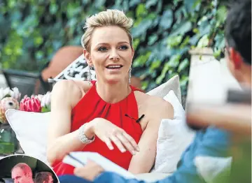  ?? Pictures: MOELETSI MABE ?? HOLDING COURT: Princess Charlene of Monaco in Johannesbu­rg to promote her charitable foundation. On the left are former Springbok rugby captains Francois Pienaar and (behind him) John Smit. Pienaar is one of the ambassador­s of the foundation