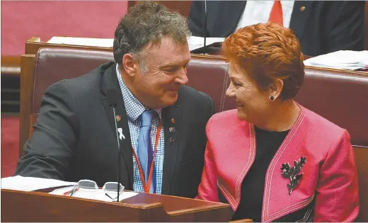  ?? PHOTO: AAP/MICK TSIKAS ?? One Nation Senators Rodney Culleton and Pauline Hanson during the Backpacker Tax Bill vote in the Senate chamber at Parliament House in Canberra, Thursday, November 24.