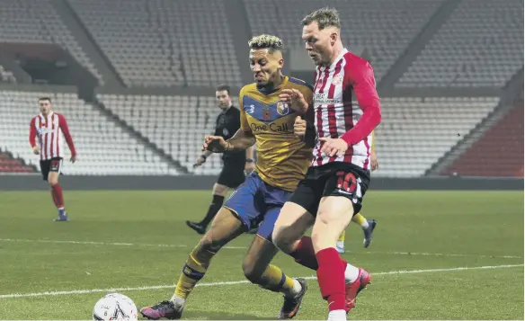  ??  ?? Sunderland’s Aiden O’Brien in action against Mansfield Town.