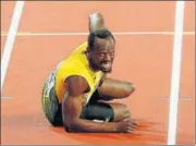  ?? REUTERS ?? Usain Bolt stopped abruptly with cramps in his left hamstring, began hobbling and tumbled to a halt after a forward roll while anchoring Jamaica in the 4x100m relay final. Assisted by his three teammates, he got up and limped to the finish line to...