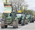  ?? PHOTO: SANDY EGGLESTON ?? Some of the more than 100 tractors and their drivers who protested freshwater reforms at a rally in Gore recently.