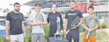  ??  ?? (From left) France’s Jo-WilfriedTs­onga, Rafael Nadal of Spain,Andy Murray of Britain, Nick Kyrgios of Australia, and Kei Nishikori of Japan pose with the Brisbane Internatio­nal tennis tournament trophy in front of the Queensland Tennis centre in Brisbane. — AFP photo
