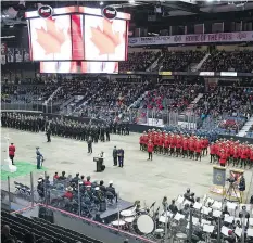  ??  ?? The hockey arena provided comfortabl­e shelter for aging veterans as well as for those who came out to show their respect and appreciati­on.