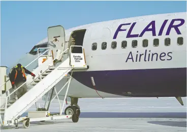  ?? LARRY WONG / POSTMEDIA ?? The possibilit­y that Edmonton-based Flair Airlines could see its licence suspended
has some Canadians worried about their booked flights.