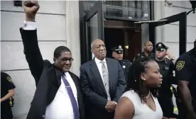  ?? Picture: AP ?? VICTORIOUS: Andrew Wyatt raises his fist as Bill Cosby exits the Montgomery County Courthouse after a mistrial was declared.