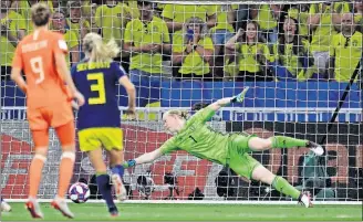  ?? [ALESSANDRA TARANTINO/THE ASSOCIATED PRESS] ?? The winning goal in extra time gets past Sweden goalkeeper Hedvig Lindahl.