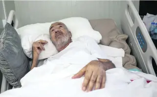  ?? Victor Besa for The National ?? Bedridden diabetic Hussein Ramadan is 78. His treatment has cost Dh84,000.