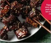  ?? ?? These sweet, sour and chewy pork spare ribs are a Shanghai classic.