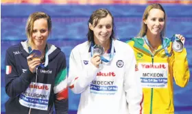  ?? Darko Bandic / Associated Press ?? Italy’s Federica Pellegrini beat Stanford’s Katie Ledecky and Australia’s Emma McKeon, who shared the silver medal in the 200-meter freestyle.