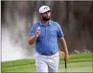  ?? PHELAN M. EBENHACK — THE ASSOCIATED PRESS ?? Jon Rahm acknowledg­es the gallery after making a birdie putt on the 18th green during the first round of the Arnold Palmer Invitation­al on Thursday in Orlando, Fla.