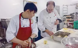  ??  ?? Chef Anton and Chef Marty are busy prepping for the main event of Let it Snow, Canada Beef’s finale for the Canada 150 celebratio­n