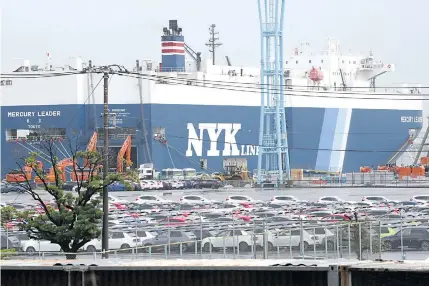  ?? AP PHOTO ?? INCREASE
Cars for export park at a port in Yokohama, near Tokyo, on July 6, 2020. Japan’s exports grew to nearly 12 percent in January while its trade deficit decreased to 1.76 trillion yen ($12 billion), according to government data on Wednesday, Feb. 21, 2024.