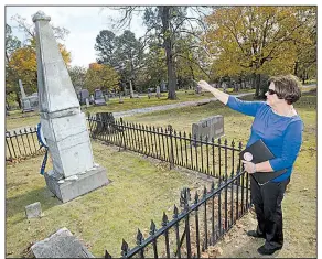  ?? NWA Democrat-Gazette/ANDY SHUPE ?? “There’s not any way to fix this,” Fayettevil­le Evergreen Cemetery Associatio­n President Marilyn Heifner said of the deteriorat­ing obelisk marking Archibald Yell’s final resting place.