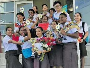  ?? Photo: Neelam Prasad ?? Tegumailag­i Toganivalu (middle row/second from left), with other awardees after the school’s annual prizegivin­g ceremony on October 12, 2018.