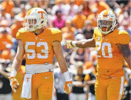  ?? STAFF FILE PHOTO BY ROBIN RUDD ?? Baylor School alum Colton Jumper, left, is practicing as a No. 1 linebacker for Tennessee this week as the Vols prepare to host Ohio on Saturday. Starter Darrin Kirkland Jr. was injured during last week’s game against Virginia Tech, and Jumper finished...