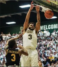  ?? AP/The Burlington Free Press/RYAN MERCER ?? Vermont junior forward Anthony Lamb (right), who leads the America East Conference in scoring (21.4 points per game) and ranks second in rebounding (7.8 per game), will lead the Catamounts into Thursday’s game against Florida State in Hartford, Conn.