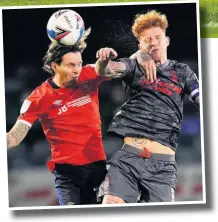 ??  ?? Nottingham Forest’s Jack Colback (right) challenges Luton Town’s Glen Rea during Wednesday night’s clash.