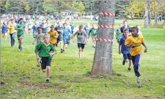  ?? ERIC MCCARTHY/JOURNAL PIONEER ?? A mass start in last year’s Zone 1 pre-novice boys’ race at Mill River. The Mill River park and campground will play host to the 2018 P.E.I. School Athletic Associatio­n provincial cross-country championsh­ips on Saturday for runners in the pre-novice to Intermedia­te age categories. The first race starts at 10 a.m.