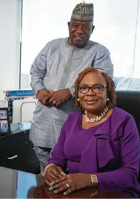  ?? Yi-Chin Lee / Staff photograph­er ?? Lanre “Larry” Omotoso and his wife, Abiodun “Abbey” Omotoso, run Millennium Broadcasti­ng Channel, an over-the-air channel aimed at the African community.